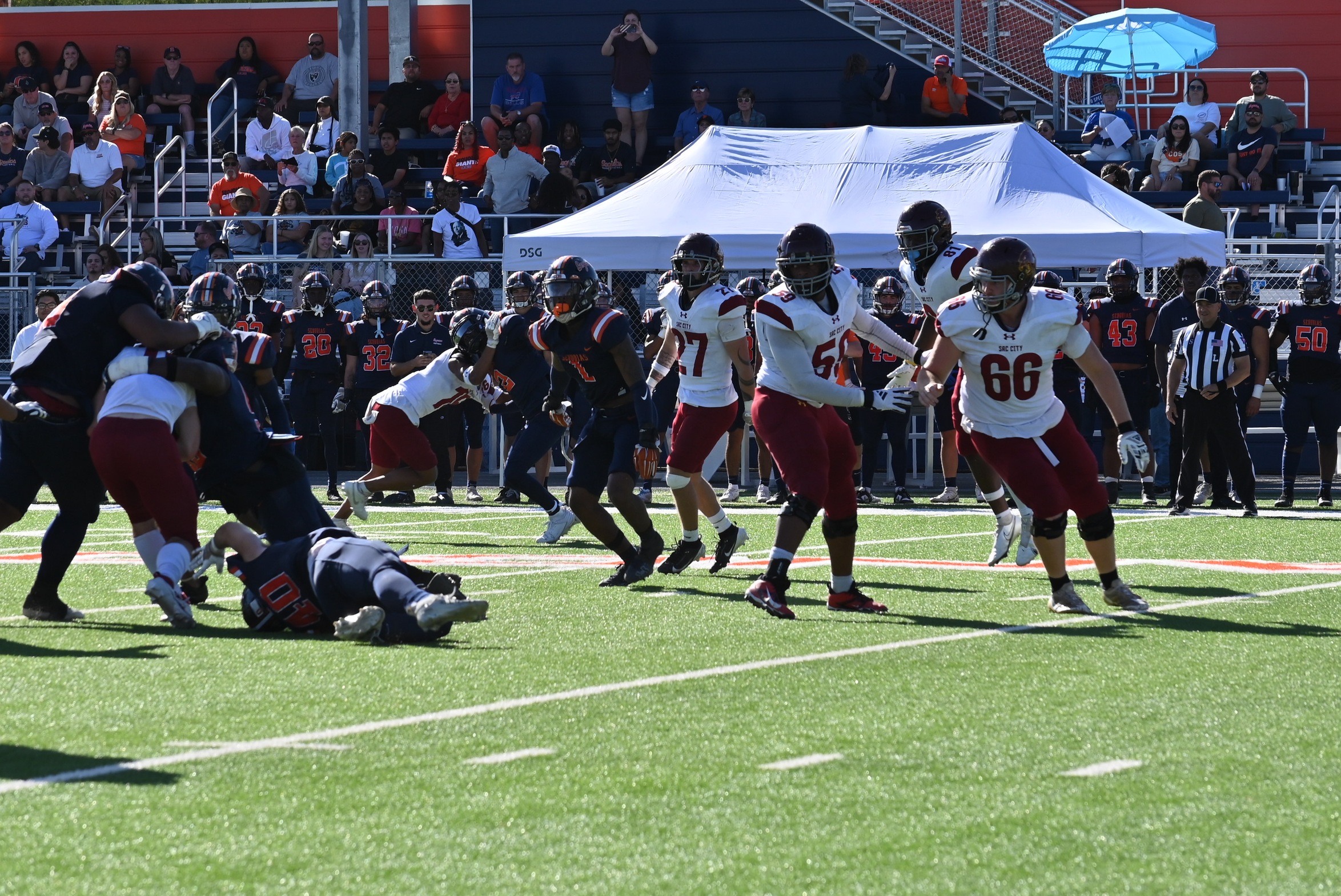 College of the Sequoias' defense making a play in a game versus Sacramento City on October 19, 2024. (Photo Credit: Norma Foster / COS Athletics)