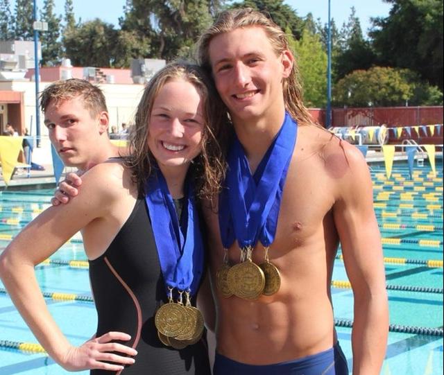Giants' women, men roll to CVC swimming and diving titles